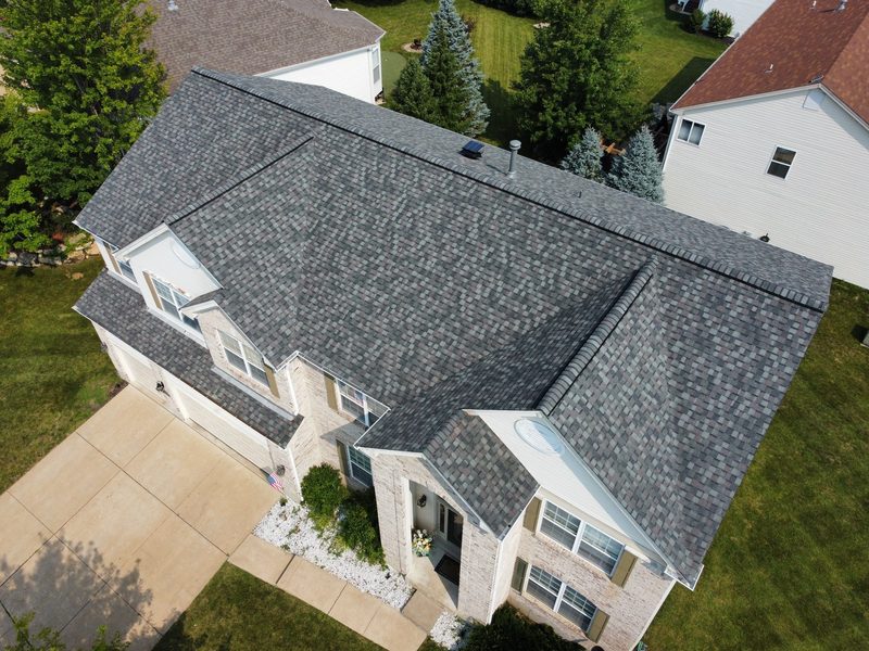 Aerial view of a freshly installed architectural shingle roof on a St. Louis home